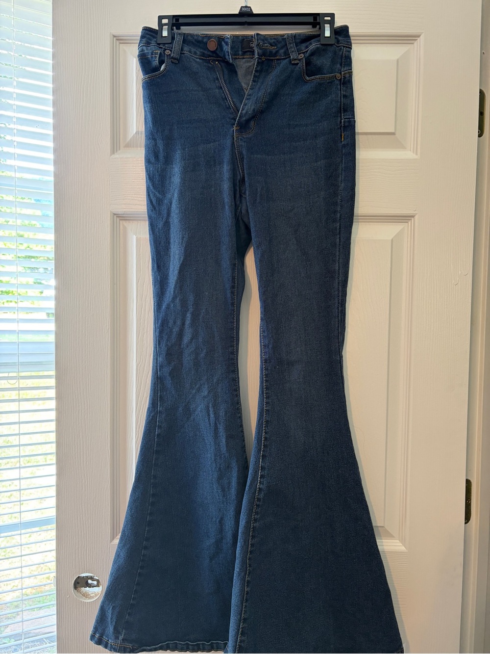 High-Rise Flare Jeans in Dark Blue - Women's